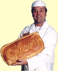 Photo: Paul with a decorated loaf [paul_bread.jpg 10kB]